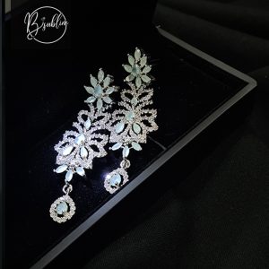 fancy earring – (silver white with lime green stone)