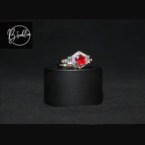 silver ring with red stone