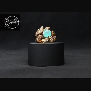 gold ring with color stone
