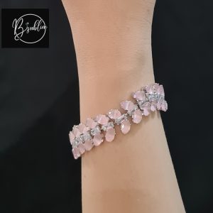 silver bracelet with light pink stone