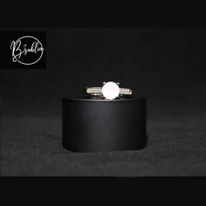 silver ring with white stone