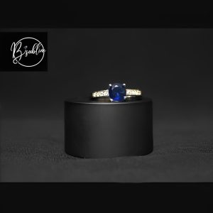 golden ring with multi color stone