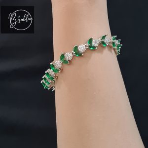 silver bracelet with green stone